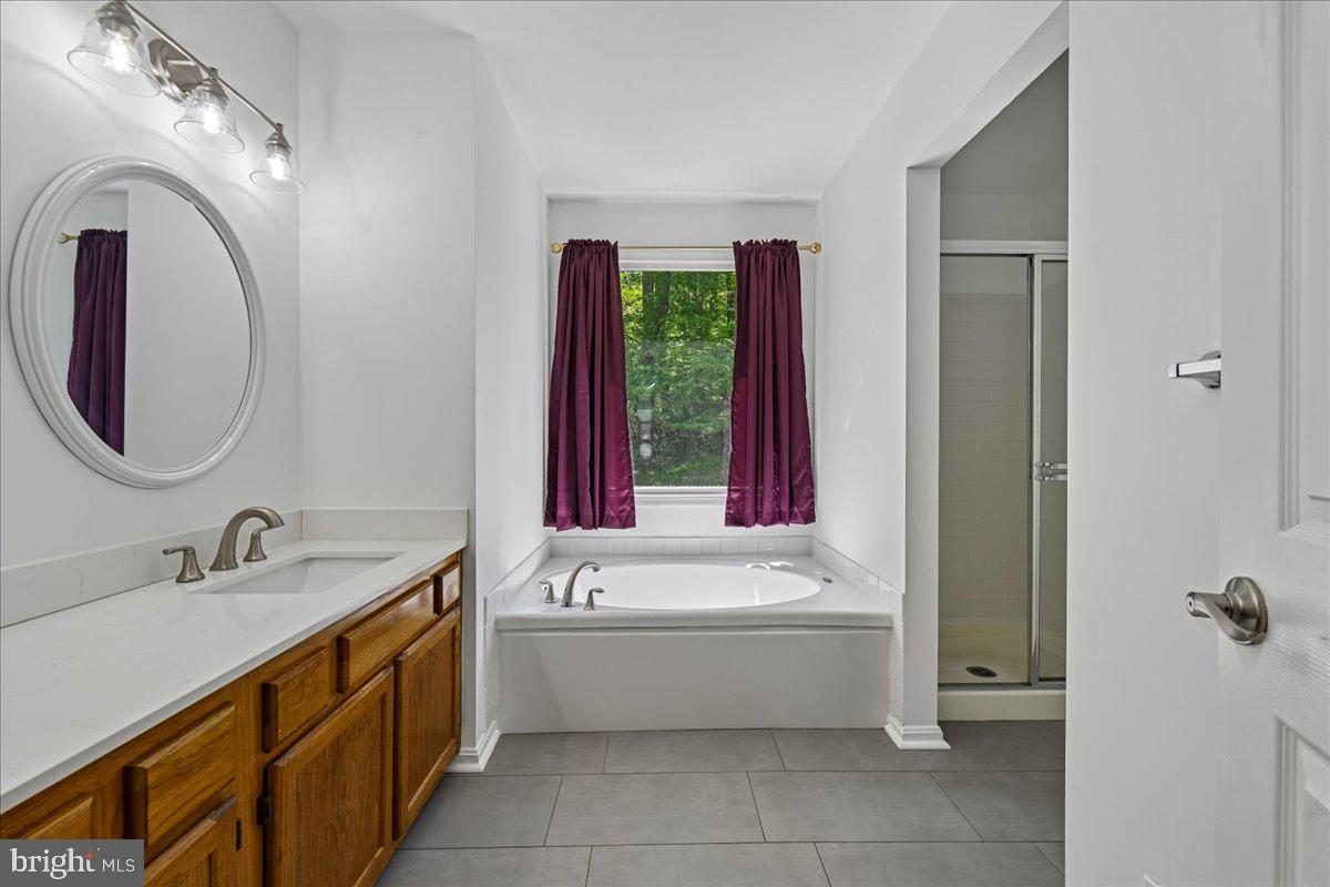 903 Brook Street Accokeek, MD 20607 - Photo 29 of 56 Primary Bath with Soaking Tub & Separate Shower