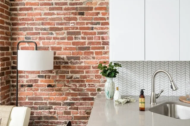 a bathroom with a sink and a shower