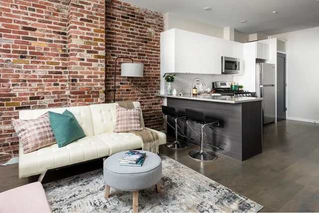 a living room with a couch and a coffee table