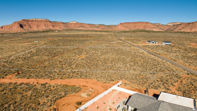 11 Crimson Road East, Unit 11 Kanab, UT 84741 - Photo 19 of 21 View of rural area featuring a mountainous background and a desert landscape