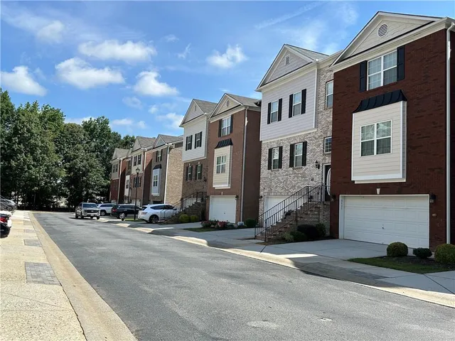 a street view along with residential houses