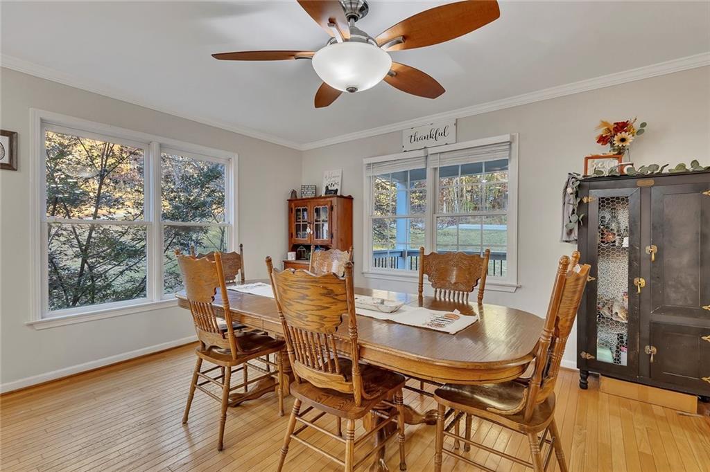 1620 Palm Street Canton, GA 30115 - Photo 11 of 72 a view of a dining room with furniture window and wooden floor