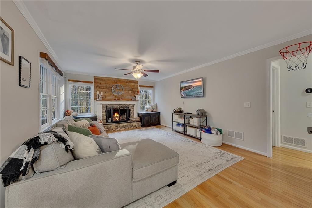 1620 Palm Street Canton, GA 30115 - Photo 22 of 72 a living room with furniture and a fireplace