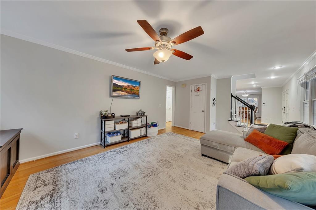 1620 Palm Street Canton, GA 30115 - Photo 24 of 72 a living room with furniture and a ceiling fan