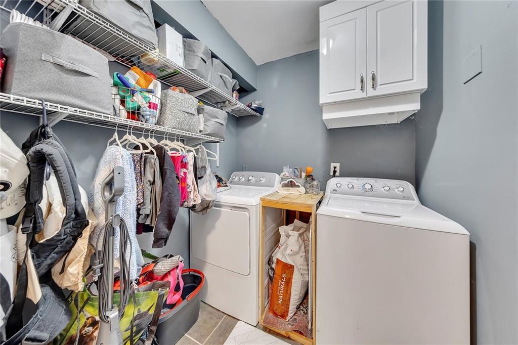 1620 Palm Street Canton, GA 30115 - Photo 31 of 72 a utility room with dryer and washer