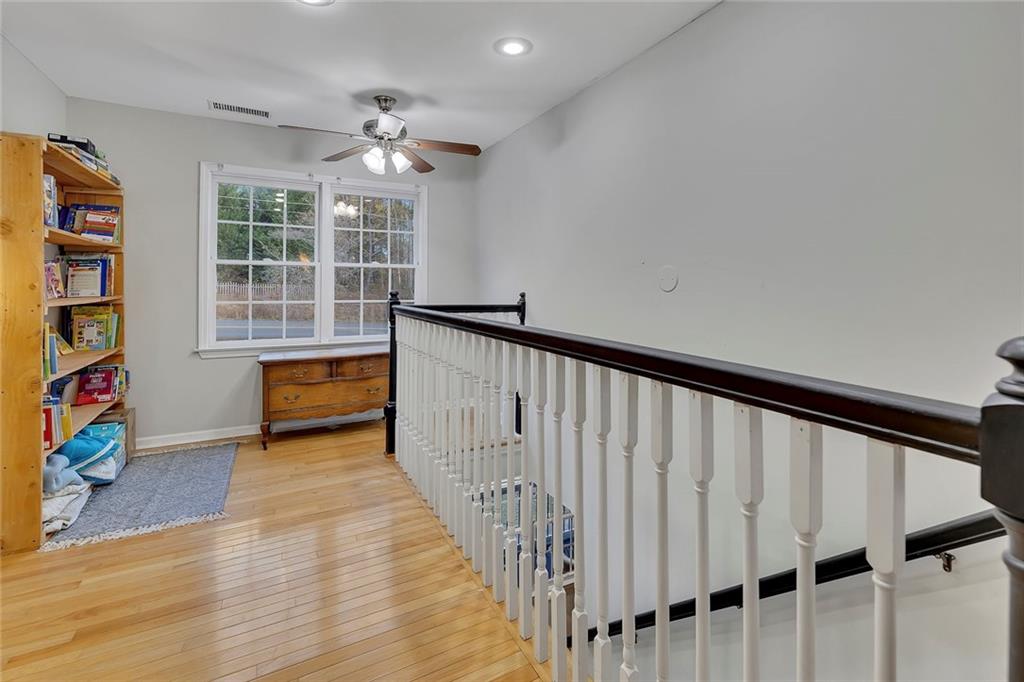 1620 Palm Street Canton, GA 30115 - Photo 32 of 72 wooden floor in an empty room with a window