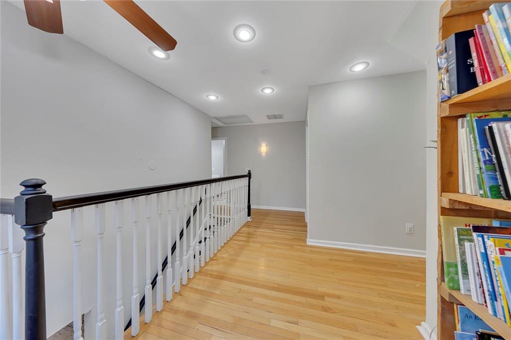 1620 Palm Street Canton, GA 30115 - Photo 33 of 72 a view of a hallway with wooden floor and entryway
