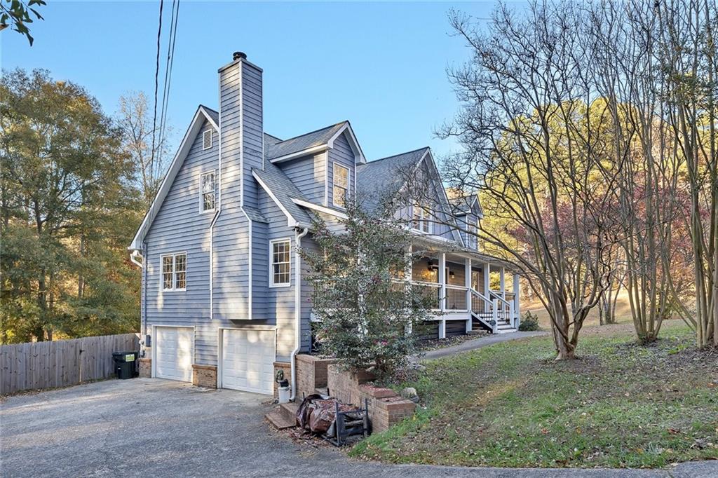 1620 Palm Street Canton, GA 30115 - Photo 5 of 72 a view of a house with a yard and tree s