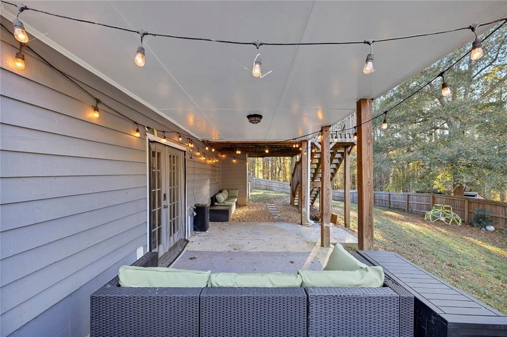 1620 Palm Street Canton, GA 30115 - Photo 51 of 72 a view of a porch with a hanging chair