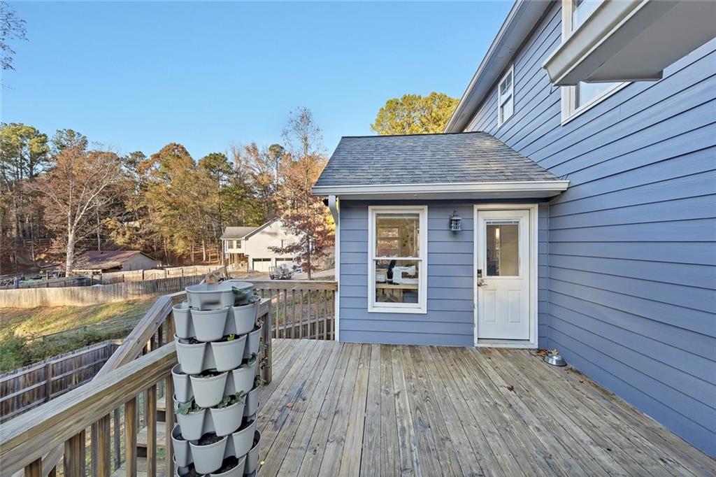 1620 Palm Street Canton, GA 30115 - Photo 54 of 72 a view of a house with a roof deck