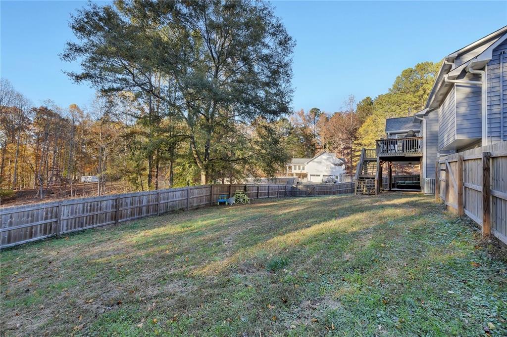 1620 Palm Street Canton, GA 30115 - Photo 55 of 72 a view of a yard with a house