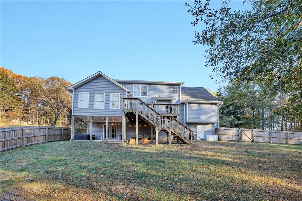 1620 Palm Street Canton, GA 30115 - Photo 58 of 72 a front view of a house with a yard