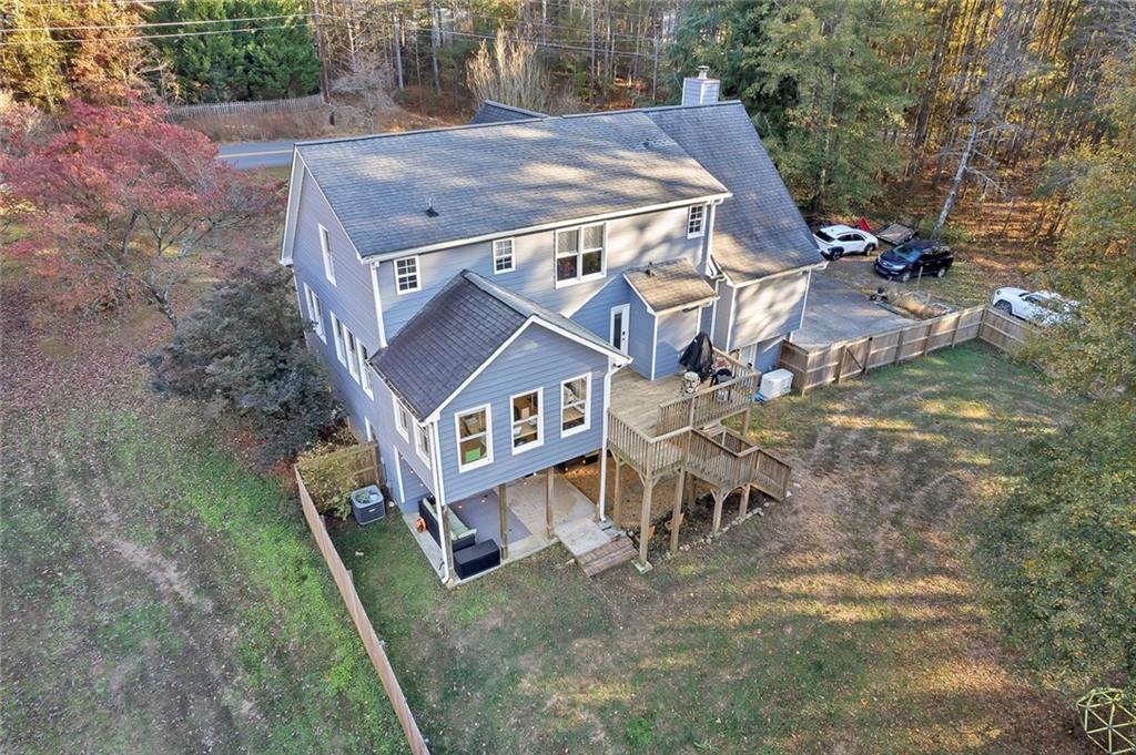 1620 Palm Street Canton, GA 30115 - Photo 62 of 72 an aerial view of a house with a yard