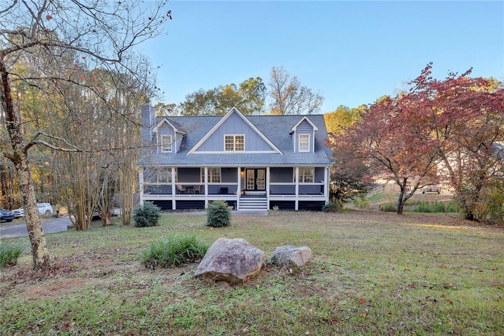 1620 Palm Street Canton, GA 30115 - Photo 7 of 72 a view of a house with a yard and a tree