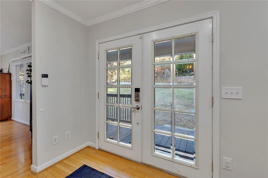 1620 Palm Street Canton, GA 30115 - Photo 9 of 72 a view of front door with wooden floor