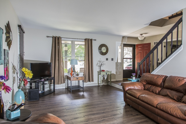 710 Heather Lane Bartlett, IL 60103 - Photo 2 of 26 a living room with fireplace furniture and a flat screen tv
