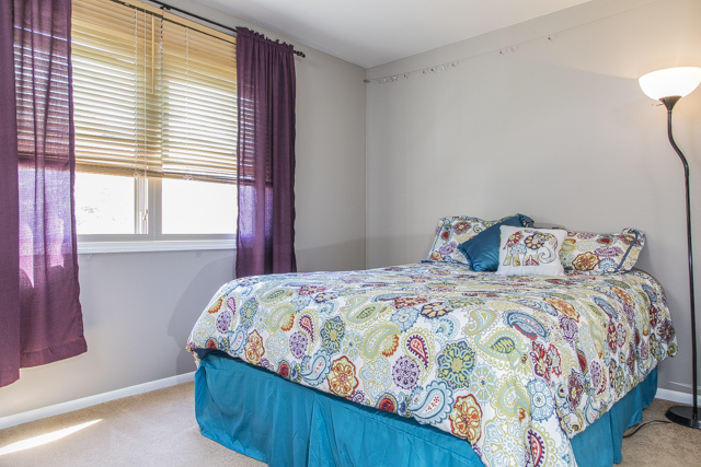 710 Heather Lane Bartlett, IL 60103 - Photo 11 of 26 a bedroom with a bed and a window