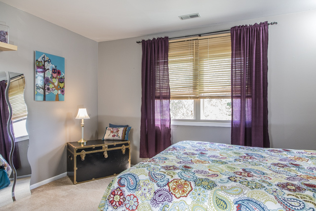 710 Heather Lane Bartlett, IL 60103 - Photo 12 of 26 a bedroom with a bed and a window
