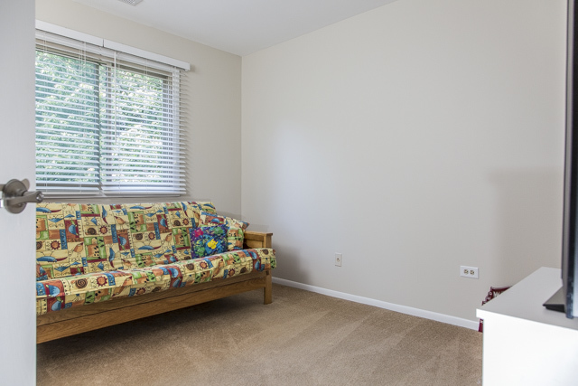 710 Heather Lane Bartlett, IL 60103 - Photo 13 of 26 a bedroom with a bed and a window