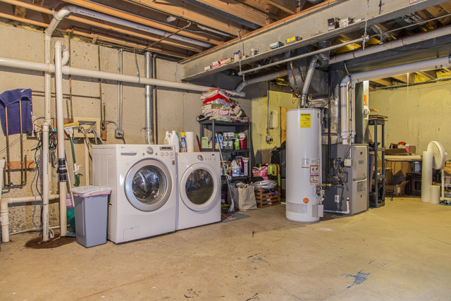 710 Heather Lane Bartlett, IL 60103 - Photo 22 of 26 a utility room with dryer and washer