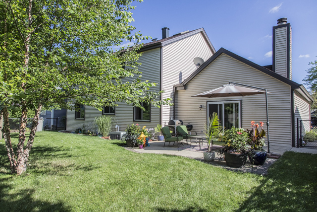 710 Heather Lane Bartlett, IL 60103 - Photo 25 of 26 a front view of house with yard and outdoor seating