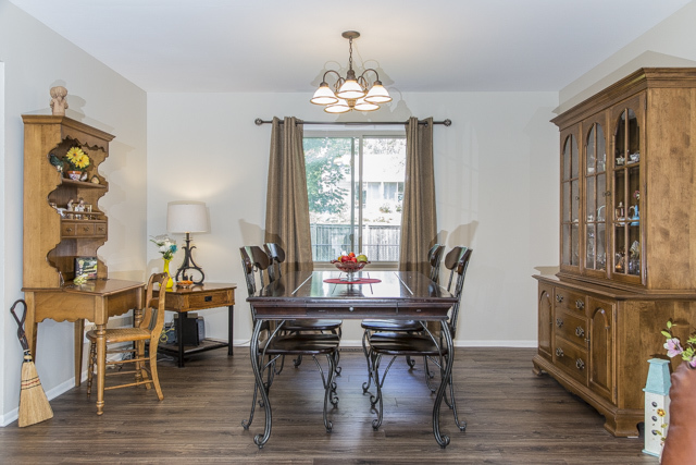 710 Heather Lane Bartlett, IL 60103 - Photo 6 of 26 a view of a dining room with furniture window and wooden floor