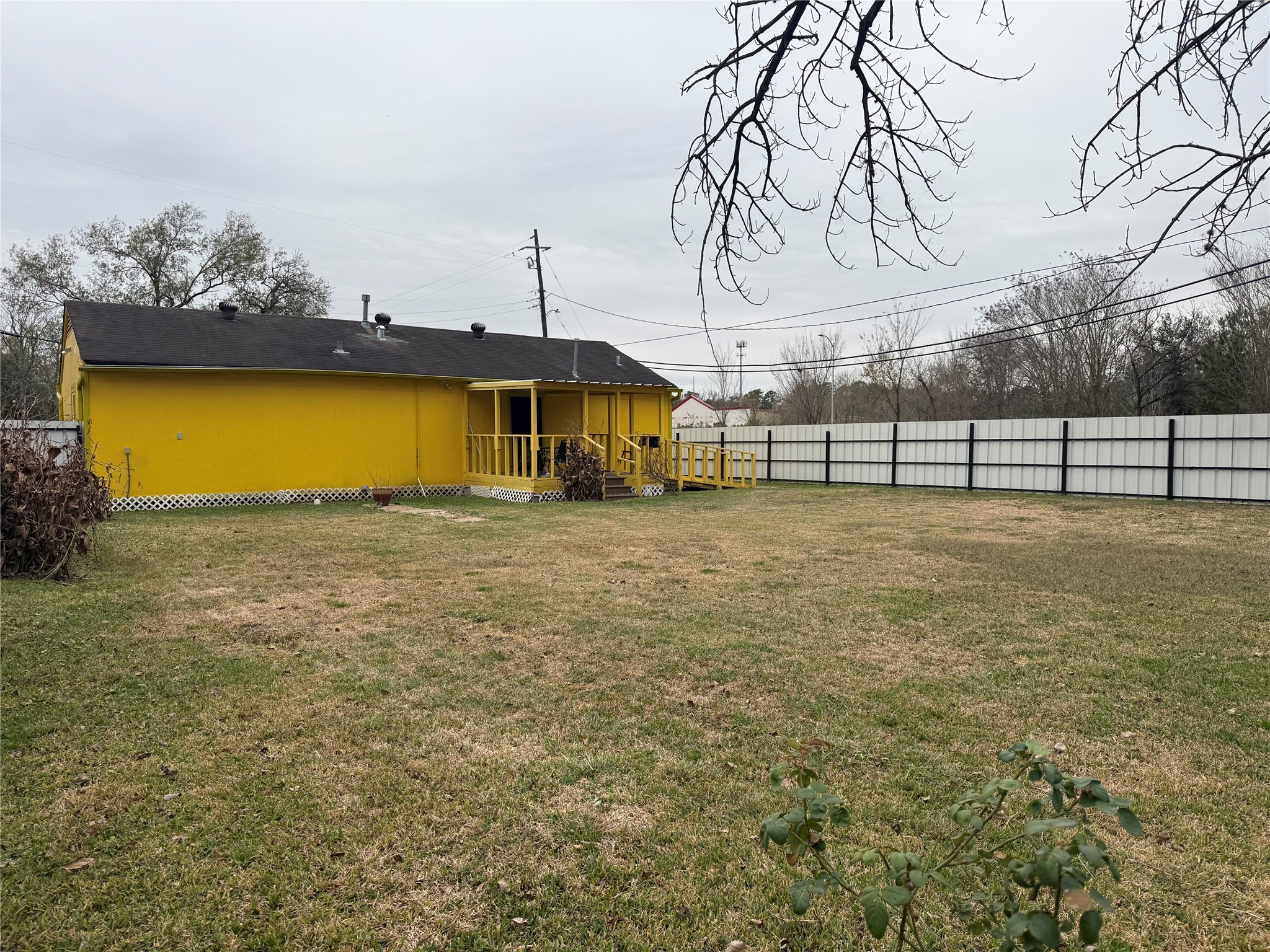 7901 Record Street Houston, TX 77028 - Photo 5 of 17 a view of a swimming pool with an outdoor space and seating area