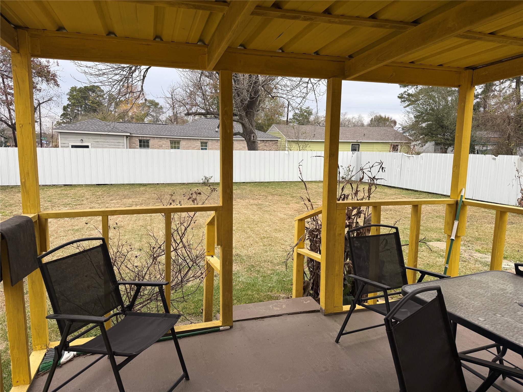 7901 Record Street Houston, TX 77028 - Photo 7 of 17 a view of a chairs and table in the patio