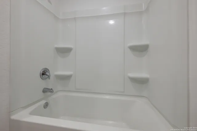 a close up of a bathtub