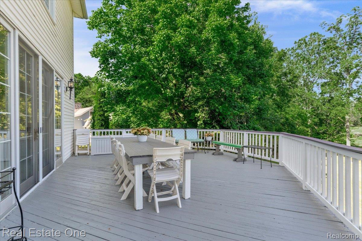 33850 Braebury Ridge Farmington, MI 48331 - Photo 70 of 85 Spacious outdoor deck featuring gray wood-finish flooring and white railings