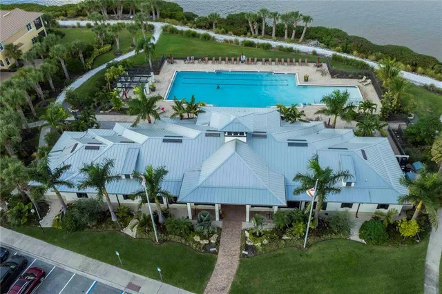 a view of a balcony with chair and table