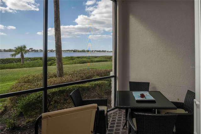 a kitchen with a stove a sink and a microwave