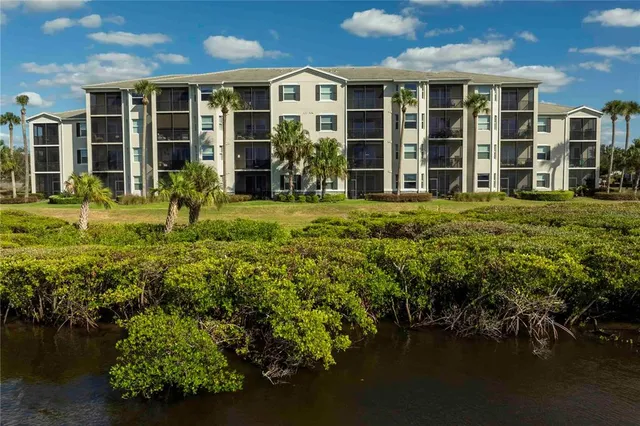 front view of a house with a garden
