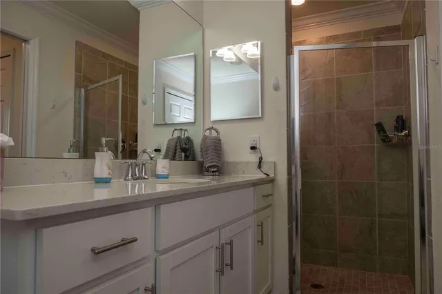 a view of swimming pool with outdoor seating and plants