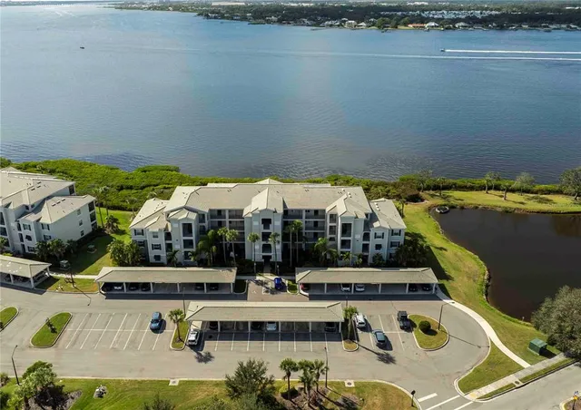 a bedroom with a bed and a night stand