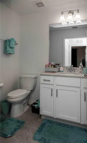 a bathroom with a tub and a shower