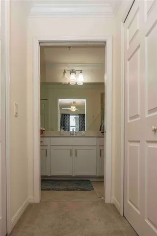 a view of a house with a small yard and plants