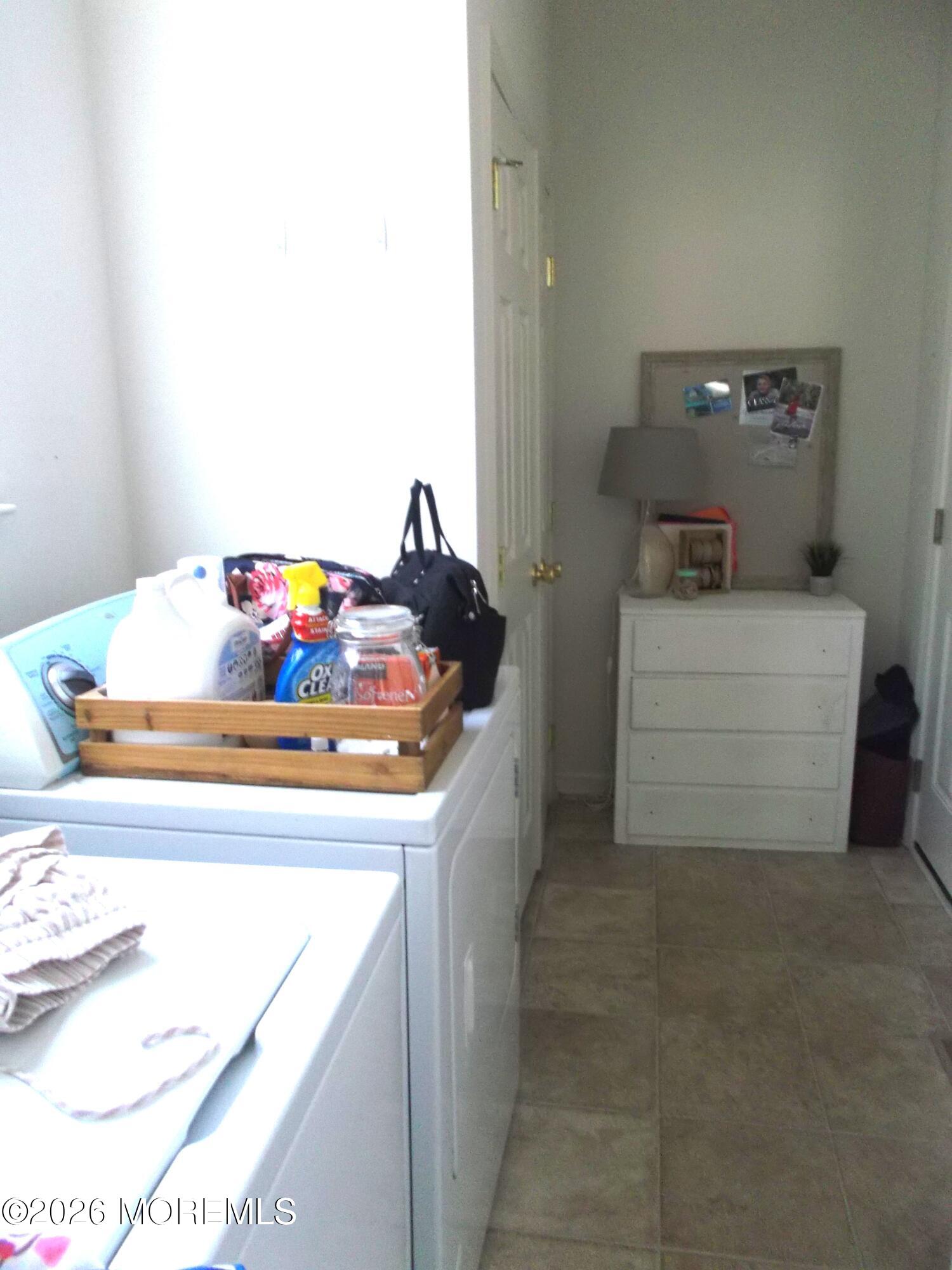 65 Homestead Drive Pemberton, NJ 08068 - Photo 11 of 26 a utility room with dryer and washer