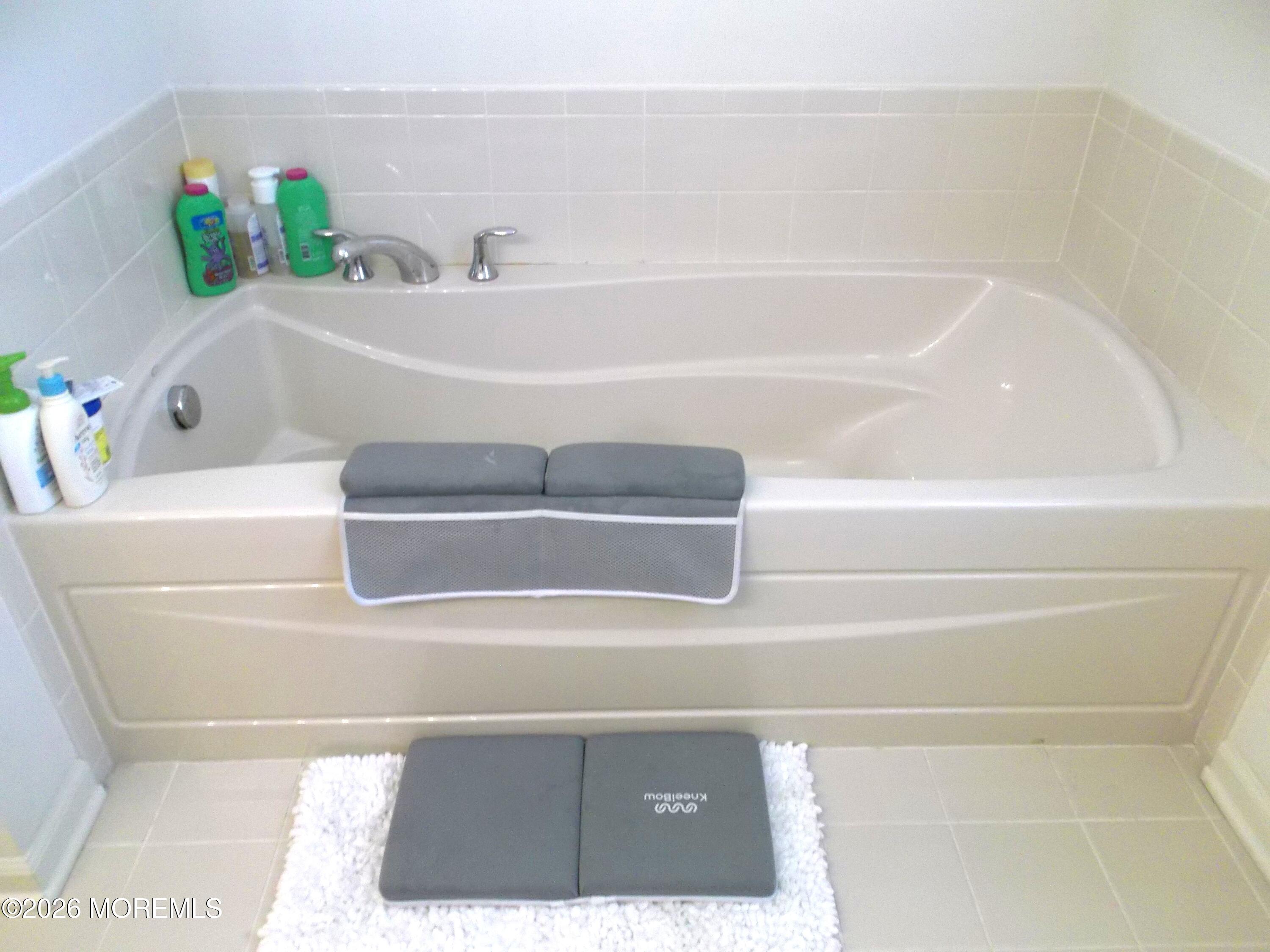 65 Homestead Drive Pemberton, NJ 08068 - Photo 16 of 26 a bathroom with a tub