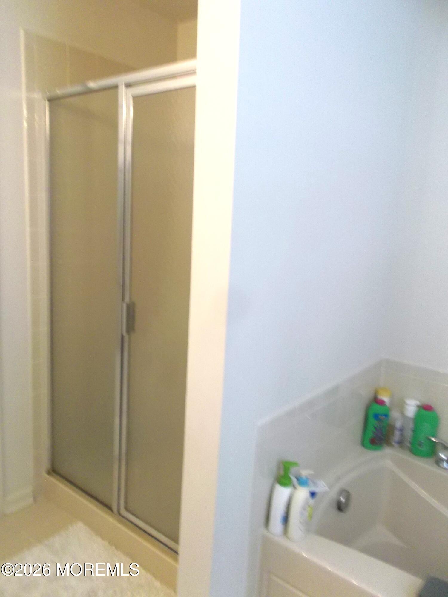 65 Homestead Drive Pemberton, NJ 08068 - Photo 17 of 26 a bathroom with a bathtub