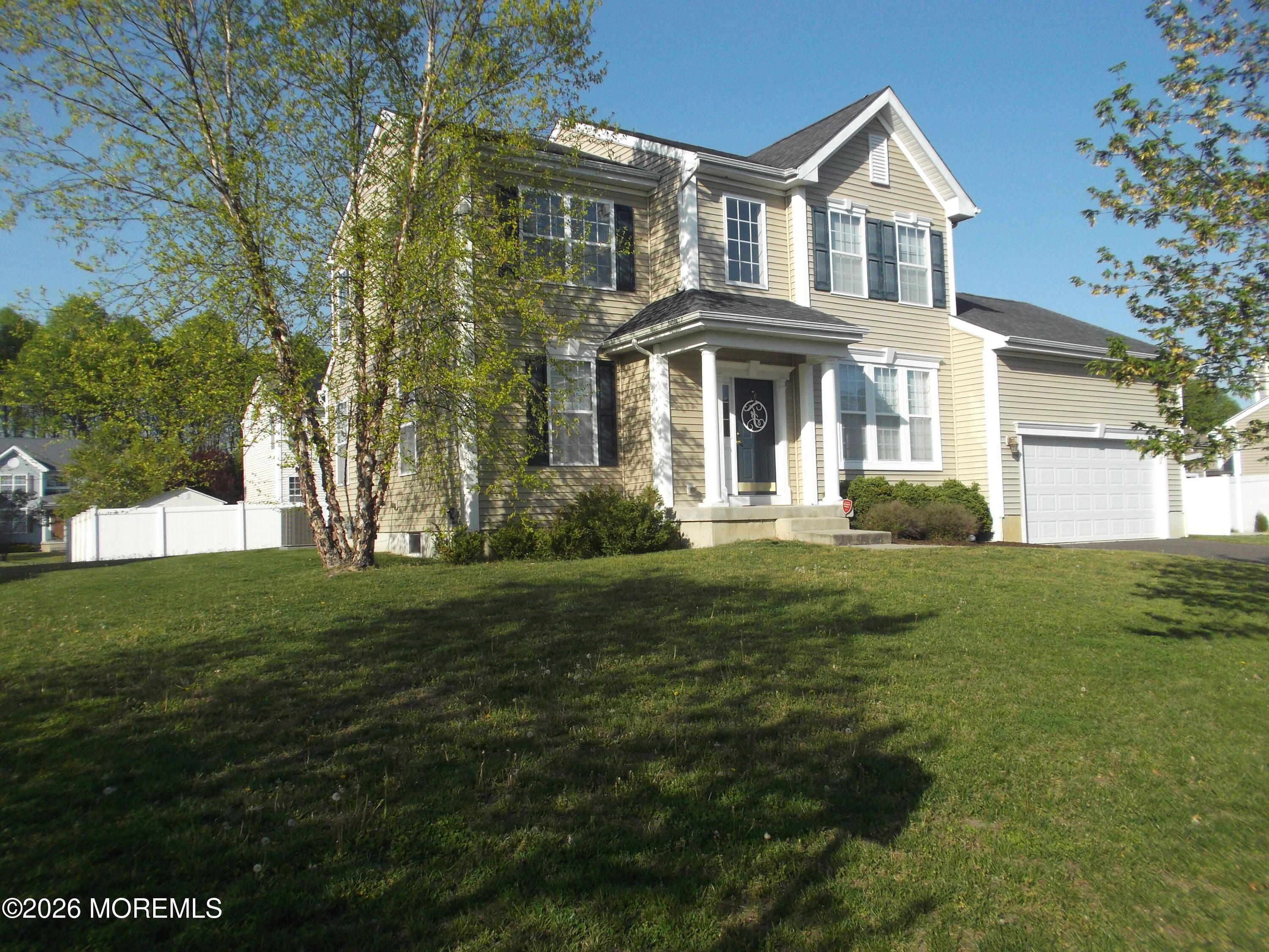 65 Homestead Drive Pemberton, NJ 08068 - Photo 3 of 26 a front view of a house with a yard