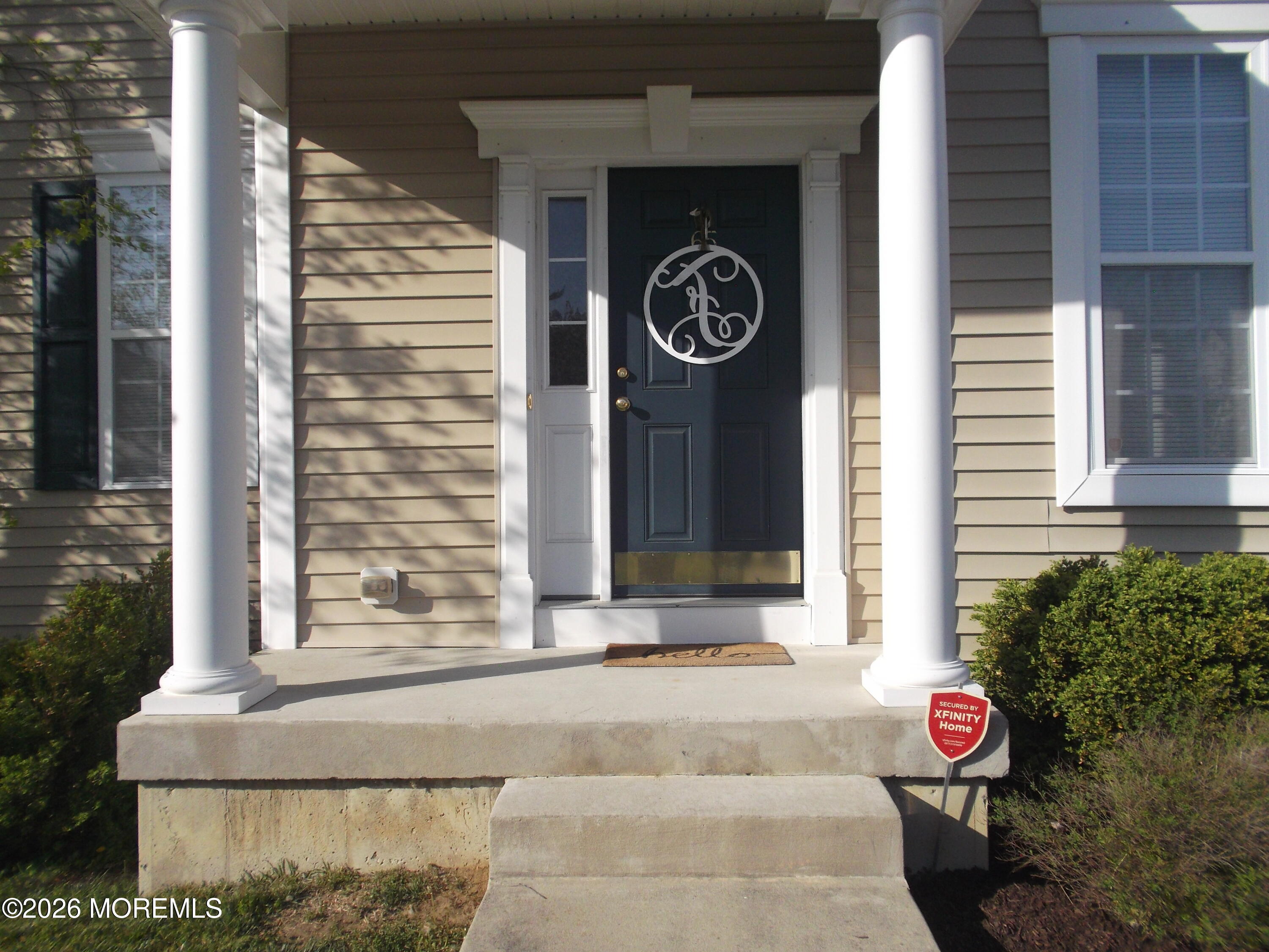 65 Homestead Drive Pemberton, NJ 08068 - Photo 4 of 26 a front view of a house with a yard