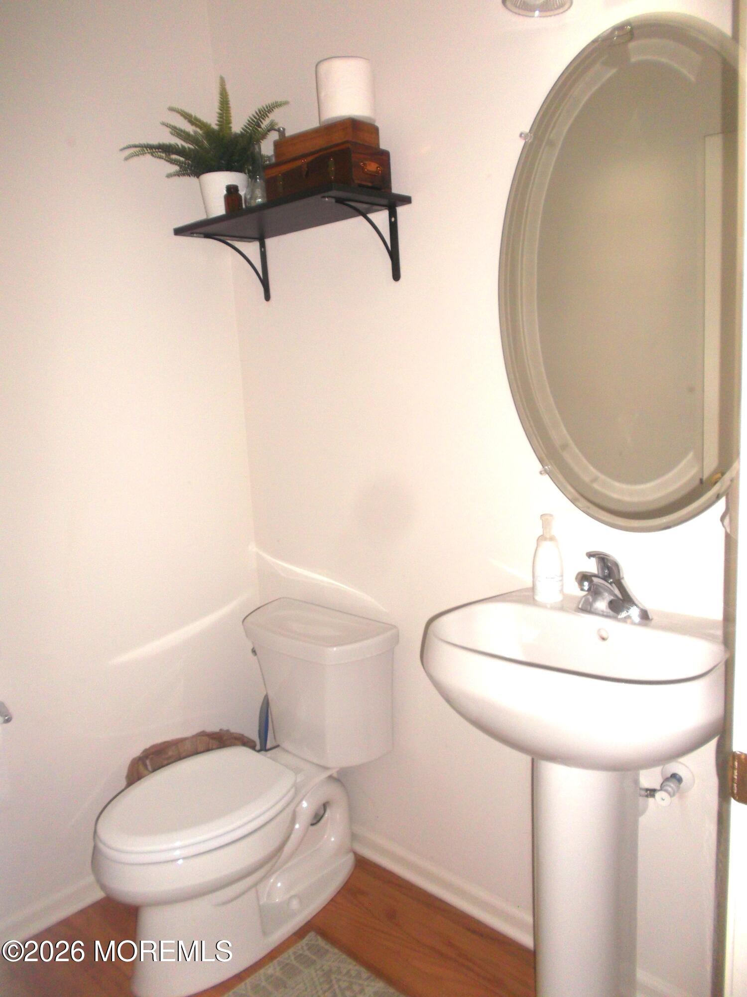65 Homestead Drive Pemberton, NJ 08068 - Photo 10 of 26 a bathroom with a sink toilet and a mirror