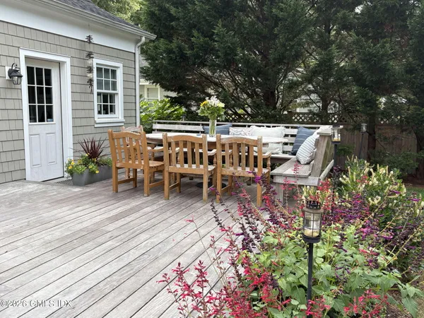 a view of a chairs and table on the wooden floor