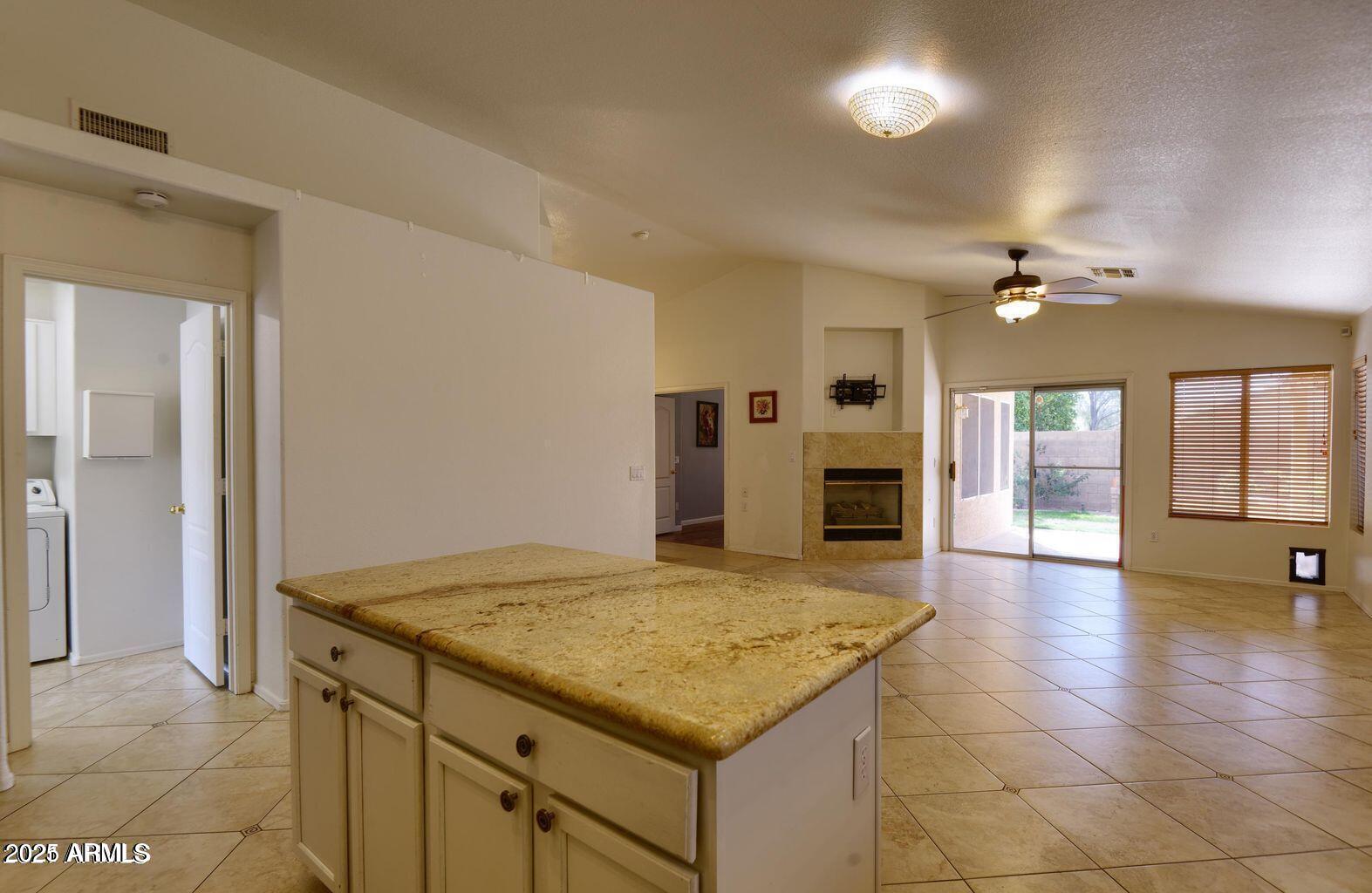 2897 East Terrace Avenue Gilbert, AZ 85234 - Photo 10 of 10 a kitchen with a sink and a refrigerator