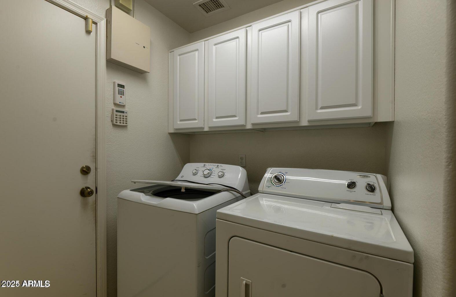 2897 East Terrace Avenue Gilbert, AZ 85234 - Photo 4 of 10 a utility room with dryer and washer