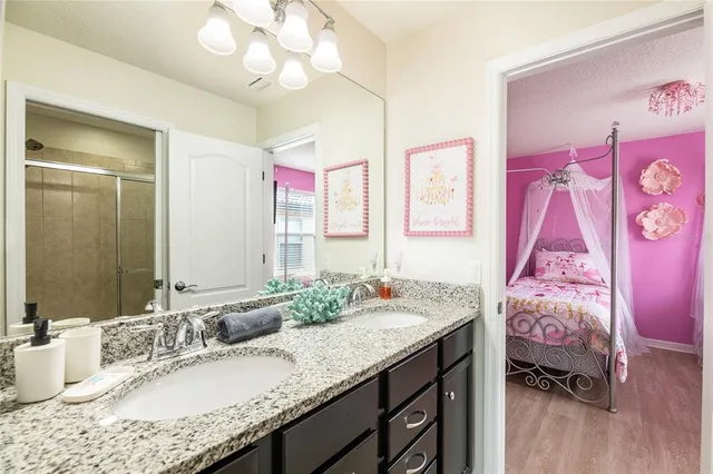 a view of a house with a yard and a table