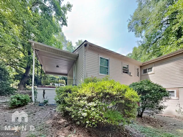 a house view with a garden space