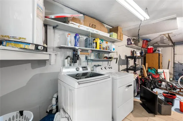 a kitchen that has a sink and a stove