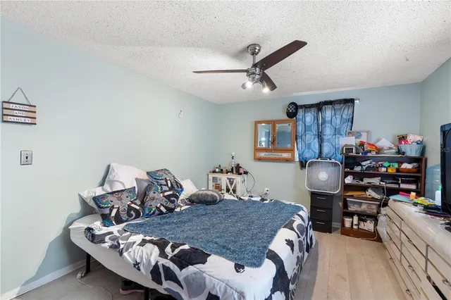 a bed room with a bed and furniture